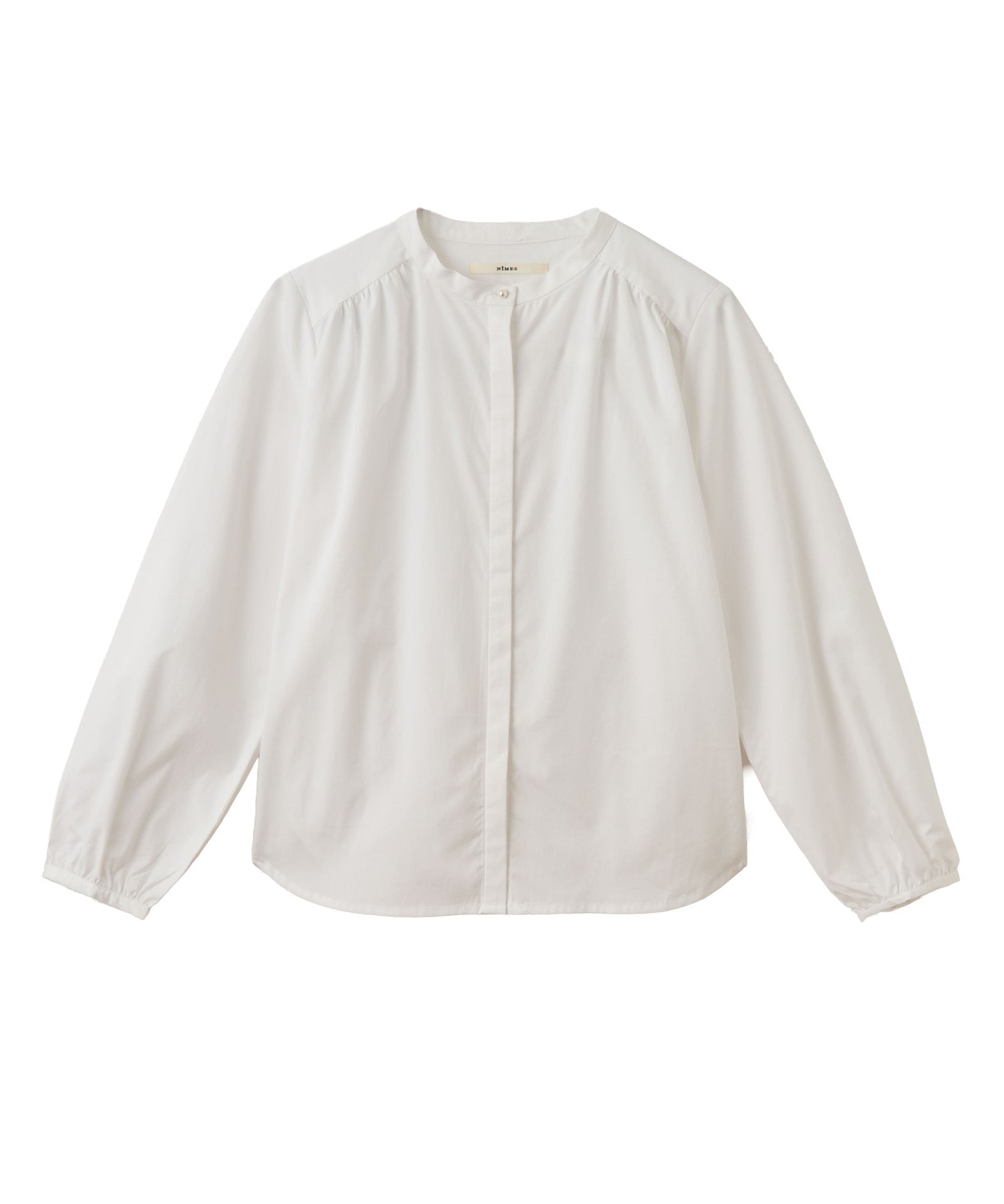 パール釦ブラウス